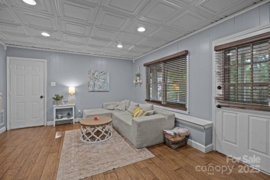 Adorable Bungalow home with tons of charm and privacy in the on Tega Cay Golf Club in South Carolina - for sale on GolfHomes.com, golf home, golf lot