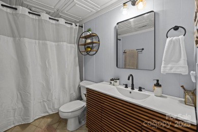 Adorable Bungalow home with tons of charm and privacy in the on Tega Cay Golf Club in South Carolina - for sale on GolfHomes.com, golf home, golf lot