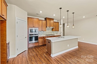 Beautifully maintained 4-bedroom, 3.5-bath detached home nestled on Verdict Ridge Golf and Country Club in North Carolina - for sale on GolfHomes.com, golf home, golf lot