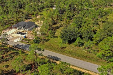 Exclusively listed by Sunland Real Estate: This prime 0.50-acre on Lehigh Resort Club in Florida - for sale on GolfHomes.com, golf home, golf lot