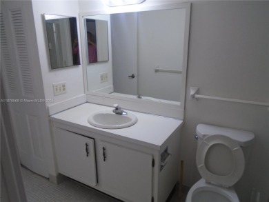 Excellent Opportunity in Inverrary! 2nd-floor 2-bedroom, 2-bath on Woodlands Country Club in Florida - for sale on GolfHomes.com, golf home, golf lot