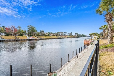 As you walk into this first floor 2 bedroom / 2 bath unit in on Barefoot Resort and Golf Club  in South Carolina - for sale on GolfHomes.com, golf home, golf lot