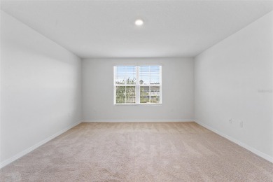 Situated on a corner lot, this contemporary two-story home with on Venetian Bay Golf Course in Florida - for sale on GolfHomes.com, golf home, golf lot