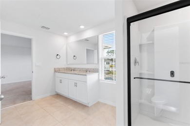 Situated on a corner lot, this contemporary two-story home with on Venetian Bay Golf Course in Florida - for sale on GolfHomes.com, golf home, golf lot