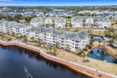 As you walk into this first floor 2 bedroom / 2 bath unit in on Barefoot Resort and Golf Club  in South Carolina - for sale on GolfHomes.com, golf home, golf lot