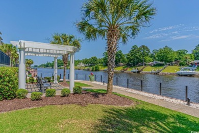 As you walk into this first floor 2 bedroom / 2 bath unit in on Barefoot Resort and Golf Club  in South Carolina - for sale on GolfHomes.com, golf home, golf lot