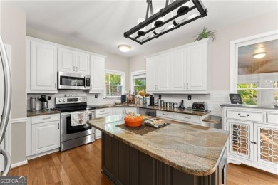 Welcome to this beautifully renovated 6-bedroom,  3.5-bath home on Bentwater Golf Club in Georgia - for sale on GolfHomes.com, golf home, golf lot