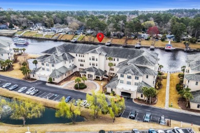 As you walk into this first floor 2 bedroom / 2 bath unit in on Barefoot Resort and Golf Club  in South Carolina - for sale on GolfHomes.com, golf home, golf lot