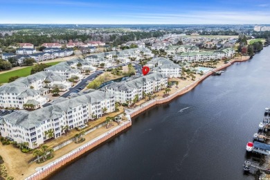 As you walk into this first floor 2 bedroom / 2 bath unit in on Barefoot Resort and Golf Club  in South Carolina - for sale on GolfHomes.com, golf home, golf lot