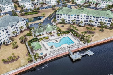 As you walk into this first floor 2 bedroom / 2 bath unit in on Barefoot Resort and Golf Club  in South Carolina - for sale on GolfHomes.com, golf home, golf lot