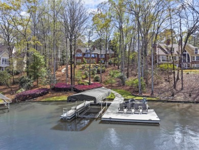 Introducing your exclusive lakeside retreat at Lake Oconee's on Great Waters Course At Reynolds Plantation in Georgia - for sale on GolfHomes.com, golf home, golf lot
