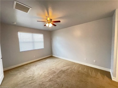 Freshly painted townhouse with master bedroom in downstairs on Vanderbilt Country Club in Florida - for sale on GolfHomes.com, golf home, golf lot