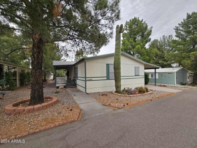 Charming 3-Bedroom Home in Pine Shadows 55+ Community - Comfort on Pine Shadows Golf Course in Arizona - for sale on GolfHomes.com, golf home, golf lot