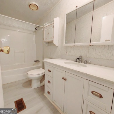 Charming & Move-In Ready in Turtle Cove!  Welcome to 281 on Turtle Cove Golf Course in Georgia - for sale on GolfHomes.com, golf home, golf lot