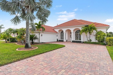 Beautiful custom lakefront home located on the Viera East Golf on Viera East Golf Club in Florida - for sale on GolfHomes.com, golf home, golf lot