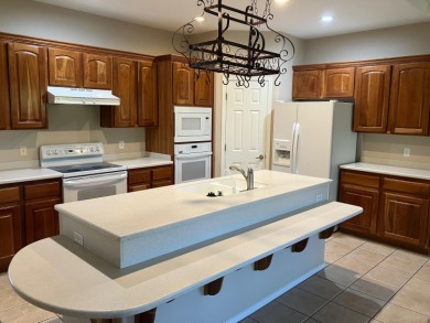 3rd Bedroom is currently a den with armoire Welcome to your on Sunriver Golf Club in Utah - for sale on GolfHomes.com, golf home, golf lot