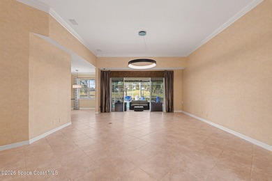 Beautiful custom lakefront home located on the Viera East Golf on Viera East Golf Club in Florida - for sale on GolfHomes.com, golf home, golf lot