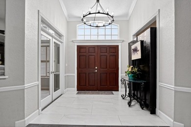 Completely renovated CBS multi-gen home with 5 bedrooms and 3 on The Cape Club of Palm City in Florida - for sale on GolfHomes.com, golf home, golf lot