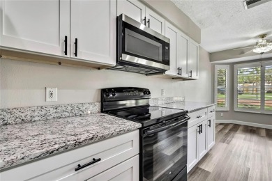 Beautiful Oakmont Model Villa with Open Floor Plan  Stunning on Timber Pines Golf Course in Florida - for sale on GolfHomes.com, golf home, golf lot