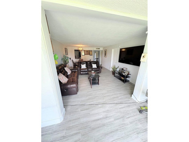 WOW!!! RARELY AVAILABLE REMODLED GROUND FLOOR CORNER UNIT on  in Florida - for sale on GolfHomes.com, golf home, golf lot