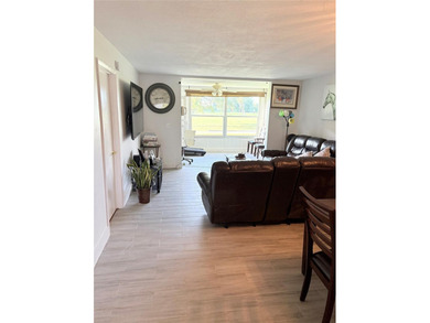 WOW!!! RARELY AVAILABLE REMODLED GROUND FLOOR CORNER UNIT on  in Florida - for sale on GolfHomes.com, golf home, golf lot