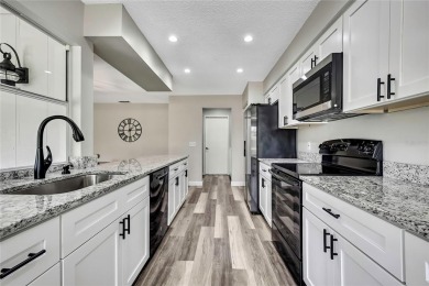 Beautiful Oakmont Model Villa with Open Floor Plan  Stunning on Timber Pines Golf Course in Florida - for sale on GolfHomes.com, golf home, golf lot