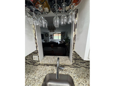 WOW!!! RARELY AVAILABLE REMODLED GROUND FLOOR CORNER UNIT on  in Florida - for sale on GolfHomes.com, golf home, golf lot