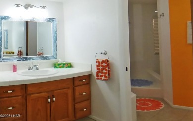 This stunning furnished 2-bedroom, 2-bath condo in Residential on London Bridge Golf Course in Arizona - for sale on GolfHomes.com, golf home, golf lot