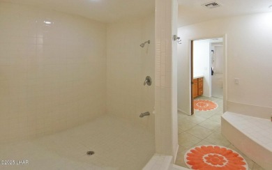 This stunning furnished 2-bedroom, 2-bath condo in Residential on London Bridge Golf Course in Arizona - for sale on GolfHomes.com, golf home, golf lot