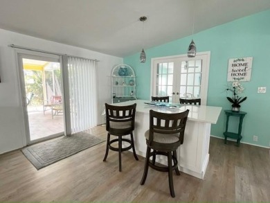 MOVE-IN READY! Renovated STUCCO 2bd/2ba home boasts a welcoming on Del Tura Golf and Country Club in Florida - for sale on GolfHomes.com, golf home, golf lot