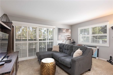 This charming one-bedroom corner unit in the gated Bixby Village on Bixby Village Golf Course in California - for sale on GolfHomes.com, golf home, golf lot