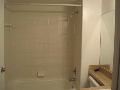 Specious 2 bed 2 bath ground floor unit with beautiful lake view on Palm-Aire Country Club and Resort - Palms in Florida - for sale on GolfHomes.com, golf home, golf lot