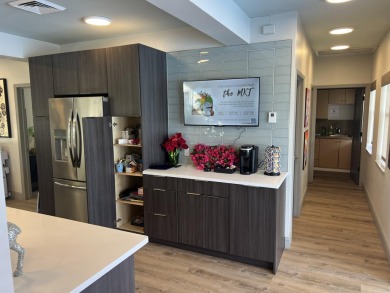 Specious 2 bed 2 bath ground floor unit with beautiful lake view on Palm-Aire Country Club and Resort - Palms in Florida - for sale on GolfHomes.com, golf home, golf lot