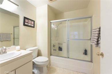 This charming one-bedroom corner unit in the gated Bixby Village on Bixby Village Golf Course in California - for sale on GolfHomes.com, golf home, golf lot