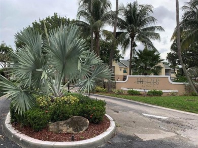 Specious 2 bed 2 bath ground floor unit with beautiful lake view on Palm-Aire Country Club and Resort - Palms in Florida - for sale on GolfHomes.com, golf home, golf lot