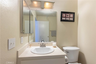 This charming one-bedroom corner unit in the gated Bixby Village on Bixby Village Golf Course in California - for sale on GolfHomes.com, golf home, golf lot