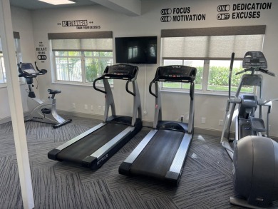 Specious 2 bed 2 bath ground floor unit with beautiful lake view on Palm-Aire Country Club and Resort - Palms in Florida - for sale on GolfHomes.com, golf home, golf lot