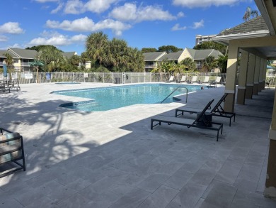 Specious 2 bed 2 bath ground floor unit with beautiful lake view on Palm-Aire Country Club and Resort - Palms in Florida - for sale on GolfHomes.com, golf home, golf lot