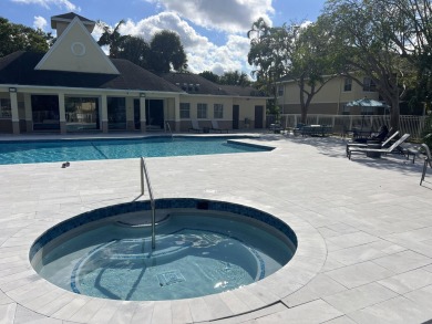 Specious 2 bed 2 bath ground floor unit with beautiful lake view on Palm-Aire Country Club and Resort - Palms in Florida - for sale on GolfHomes.com, golf home, golf lot