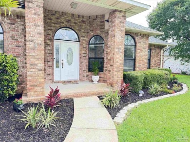 Welcome to your dream home at 3849 Saber Tooth Circle, nestled on Tiger Point Golf and Country Club in Florida - for sale on GolfHomes.com, golf home, golf lot