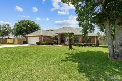 Welcome to your dream home at 3849 Saber Tooth Circle, nestled on Tiger Point Golf and Country Club in Florida - for sale on GolfHomes.com, golf home, golf lot