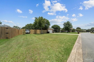 Welcome to your dream home at 3849 Saber Tooth Circle, nestled on Tiger Point Golf and Country Club in Florida - for sale on GolfHomes.com, golf home, golf lot