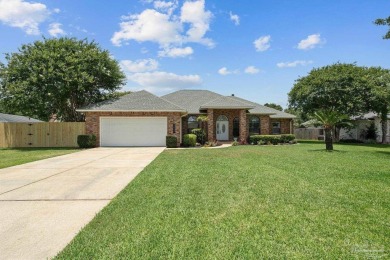 Welcome to your dream home at 3849 Saber Tooth Circle, nestled on Tiger Point Golf and Country Club in Florida - for sale on GolfHomes.com, golf home, golf lot