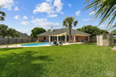 Welcome to your dream home at 3849 Saber Tooth Circle, nestled on Tiger Point Golf and Country Club in Florida - for sale on GolfHomes.com, golf home, golf lot
