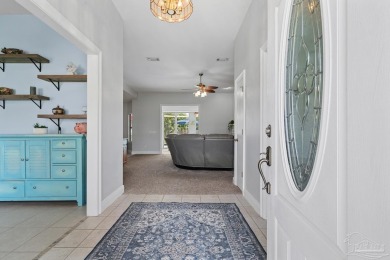 Welcome to your dream home at 3849 Saber Tooth Circle, nestled on Tiger Point Golf and Country Club in Florida - for sale on GolfHomes.com, golf home, golf lot
