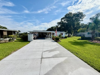 Home is located in Water Oak Country Club Estates in Lady Lake on Water Oak Country Club Estates in Florida - for sale on GolfHomes.com, golf home, golf lot