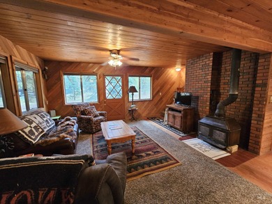 Cute as a button cabin in a great in town location! This 3 on McCall Municipal Golf Course in Idaho - for sale on GolfHomes.com, golf home, golf lot