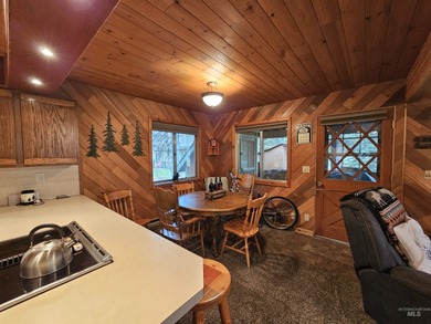 Cute as a button cabin in a great in town location! This 3 on McCall Municipal Golf Course in Idaho - for sale on GolfHomes.com, golf home, golf lot