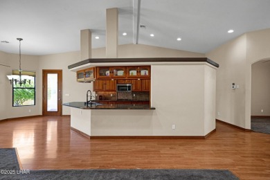 Welcome to 2620 Villa Palma, nestled in the highly sought-after on London Bridge Golf Course in Arizona - for sale on GolfHomes.com, golf home, golf lot