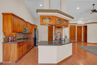 Welcome to 2620 Villa Palma, nestled in the highly sought-after on London Bridge Golf Course in Arizona - for sale on GolfHomes.com, golf home, golf lot